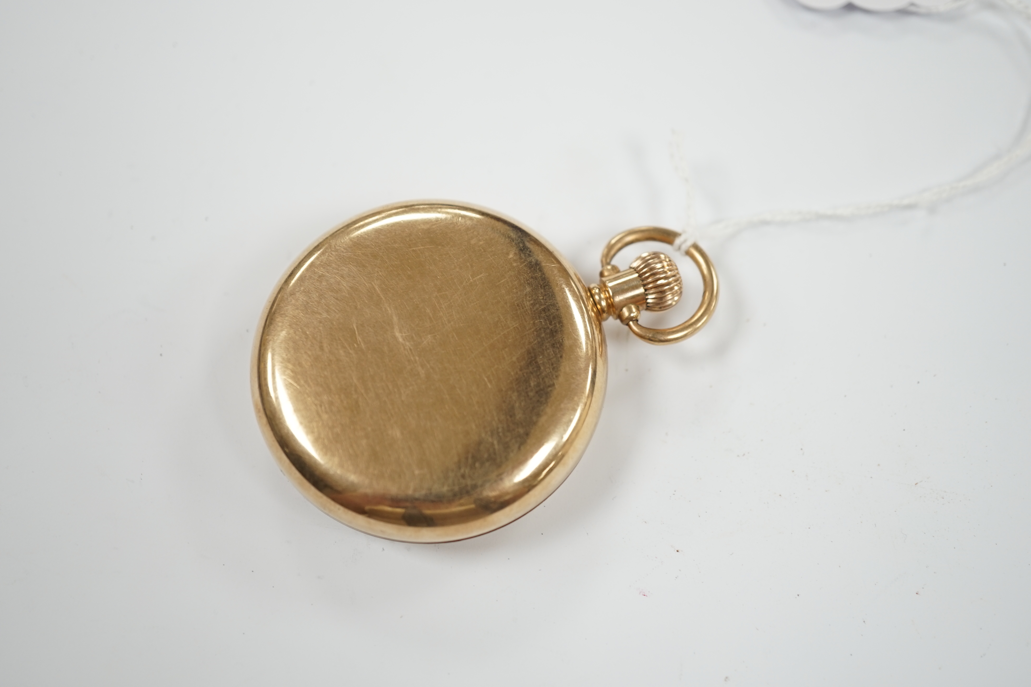 A George V 9ct gold open face keyless pocket watch, with Roman dial and subsidiary seconds, case diameter 48mm, gross weight 84.7 grams.